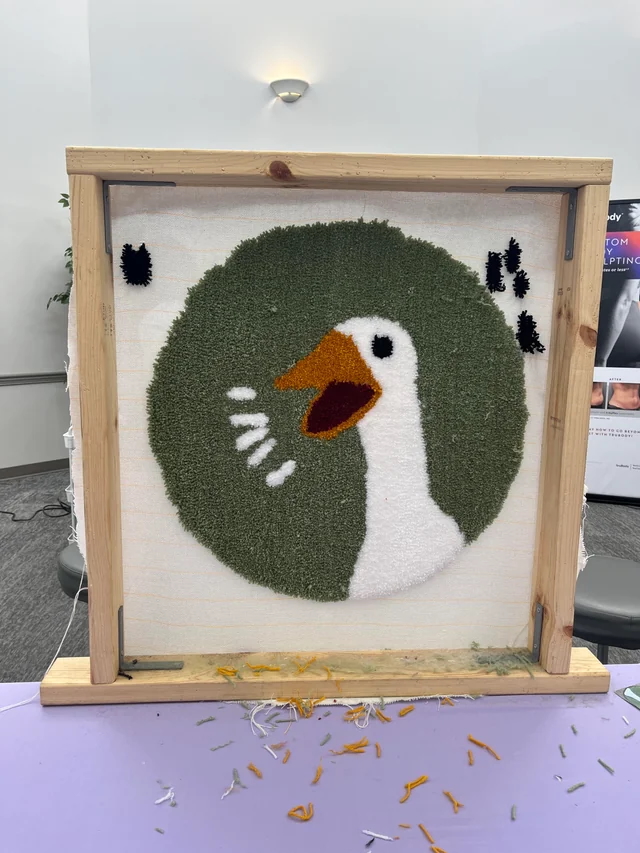 Friends enjoying tufting together in the studio