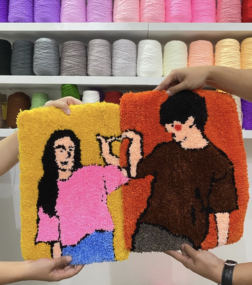 Friends enjoying tufting together in the studio